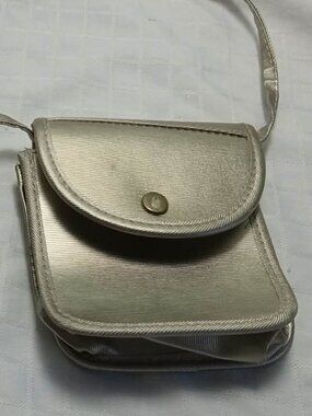 Small silver-gold Mary Kay handbag  4 1/2 X 4 1/2 inches